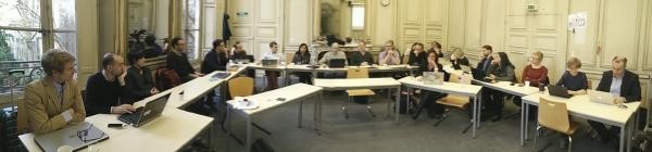 people sitting around a table for a workshop